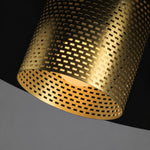 Bild in Gallery-Viewer laden, Close view of the illuminated perforated brass cylindrical lamp holder