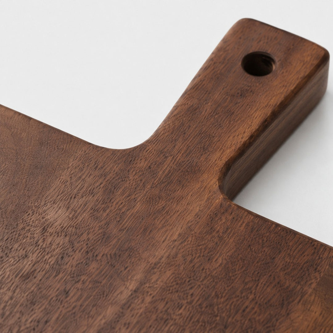 Close view of the cutting board handle and wood grain