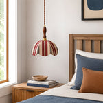Charger l'image dans la visionneuse de galerie, Red and ivory striped fabric pendant lamp installed beside a bed