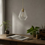 Cargar imagen en el visor de la Galería, Clear faceted glass pendant light above a wooden desk