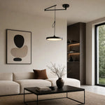 Load image into Gallery viewer, Black movable pendant light in a modern living room
