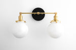 Load image into Gallery viewer, Lumio Globe Glass Globe Vanity Light - Modern Two Light Bathroom Sconce
