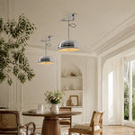 Charger l'image dans la visionneuse de galerie, Chrome pendant lights in a sunlit Bauhaus inspired dining room