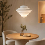 Load image into Gallery viewer, White glass pendant light over a dining table