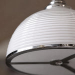 Load image into Gallery viewer, Close detail of the white ribbed shade and lower rim