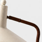 Bild in Gallery-Viewer laden, Close-up of curved brown iron arm and shade connection