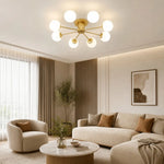Load image into Gallery viewer, Six-head gold globe ceiling light in a warm living room