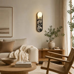 Cargar imagen en el visor de la Galería, Decorative fabric wall sconce in a soft lounge setting