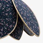 Bild in Gallery-Viewer laden, Close view of the floral fabric and metal trim