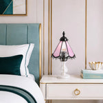 Load image into Gallery viewer, Cherry blossom pink stained glass table lamp on a nightstand beside a bed