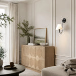 Bild in Gallery-Viewer laden, Black wall sconce installed in a living room