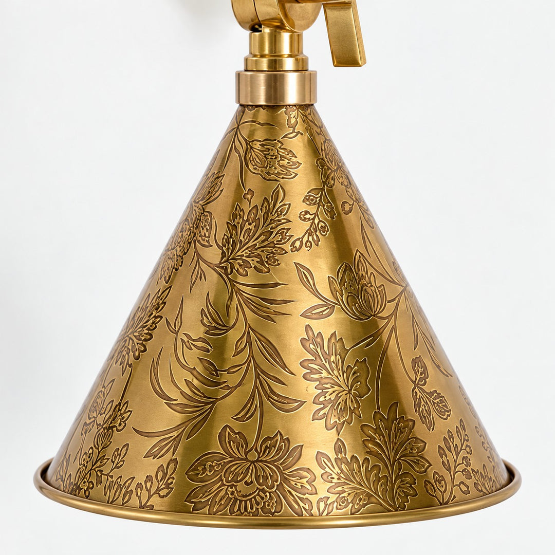 Close view of the floral etching on the steel cone