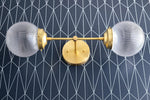 Load image into Gallery viewer, Lumio Globe Versatile Vanity Sconce - Dimmable Light for Bathroom and Hallway Use
