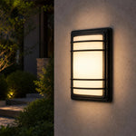 Cargar imagen en el visor de la Galería, Outdoor wall light installed on an exterior wall at night