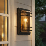 Cargar imagen en el visor de la Galería, Small bronze glass outdoor wall sconce installed beside a window