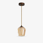 Bild in Gallery-Viewer laden, Amber glass pendant light with antique brass-tone fixture