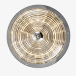 Load image into Gallery viewer, Bottom view of concentric rippled glass pattern with warm light