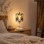 Bild in Gallery-Viewer laden, Cat stained glass table lamp glowing on a bedside table