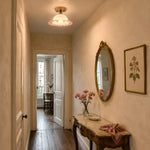 Charger l'image dans la visionneuse de galerie, ruffled glass flush mount ceiling light in a narrow hallway