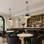 Charger l'image dans la visionneuse de galerie, Chrome pendant lights above a restaurant dining table