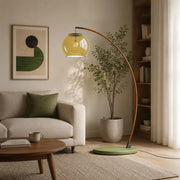 Vintage green glass floor lamp in a living room