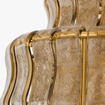 Load image into Gallery viewer, Close view of rippled textured glass and polished brass supports