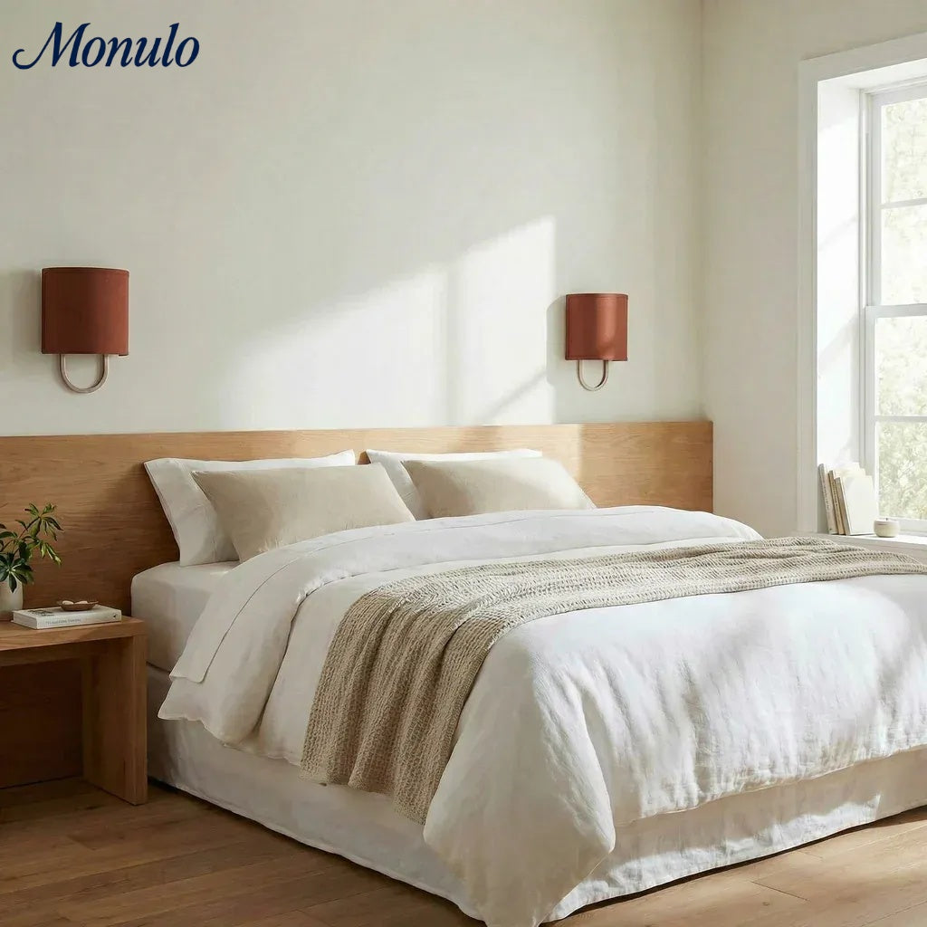 Lámpara de pared con pantalla de tela Nolvara: aplique moderno para dormitorio con una iluminación acogedora